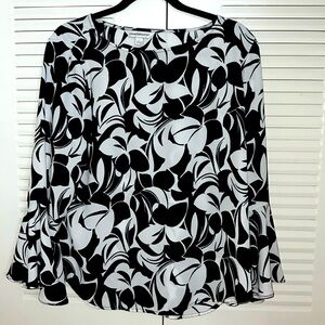 Black and white floral blouse with bell sleeves